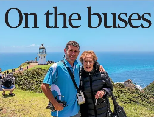  ??  ?? Auckland widow Nan Patterson, pictured here with coach driver Sean McDonnell at Cape Reinga on a Christmas in Northland tour, is a repeat customer of Moa Tours.