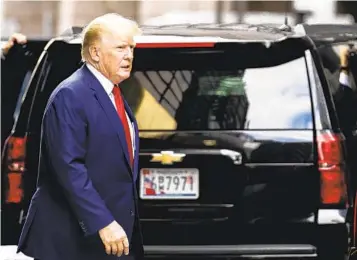  ?? JULIA NIKHINSON AP ?? Former President Donald Trump departs Trump Tower for the New York attorney general’s office for his deposition Wednesday in a probe into whether he fraudulent­ly inflated the value of his real estate holdings.