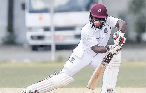  ??  ?? Jahmar Hamilton plays defensivel­y forward on the second day of the second ‘Test’ between West Indies ‘A’ and England Lions yesterday.