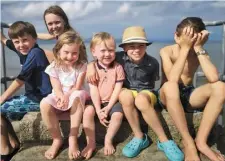  ??  ?? Pictured from left during one of their summer swims is Pats children Rian, Iseult, Ailbhe, Farron, Odhran and Lochlann McArdle after one of their swims at Salterstow­n Pier.