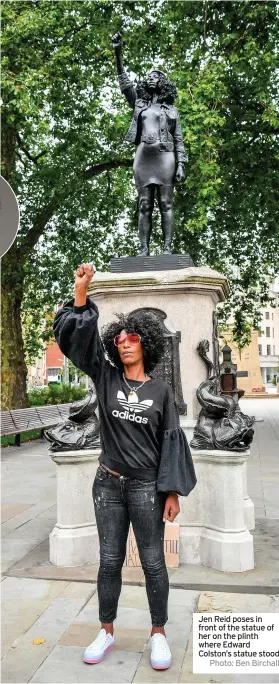  ?? Photo: Ben Birchall ?? Jen Reid poses in front of the statue of her on the plinth where Edward Colston’s statue stood