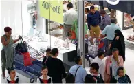  ?? Photo by Shihab ?? SHOPPING DELIGHT: Shoppers at a store in Deira City Centre during the Super Sale on Friday —