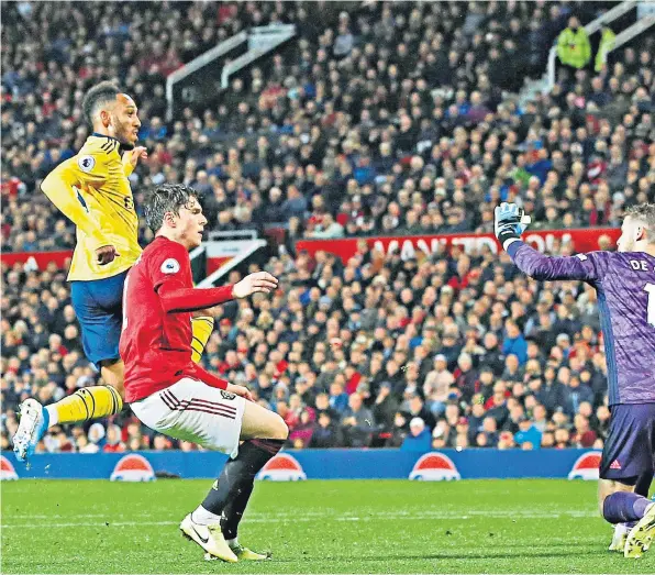  ??  ?? Lost cause: United’s appeals prove in vain as Pierre-emerick Aubameyang clips home the equalising goal