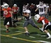  ?? RANDY MEYERS — THE MORNING JOURNAL ?? Matthew Popovich of Rocky River runs through the Normandy defense for a touchdown during the second quarter on Oct. 12.