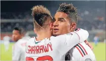  ??  ?? Had enough: Kevin-Prince Boateng, right, and his AC Milan team-mates left the pitch after racist taunts from the crowd yesterday.