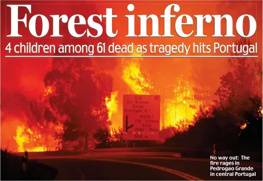  ??  ?? No way out: The fire rages in Pedrogao Grande in central Portugal