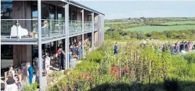  ??  ?? DRINK IN THE COUNTRYSID­E: Cornish Wine Tours puts on lunches at Trevibban Mill