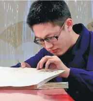  ??  ?? including Tian Tingting (top) and Li Yidong (above right) restore ancient books at the National Library of