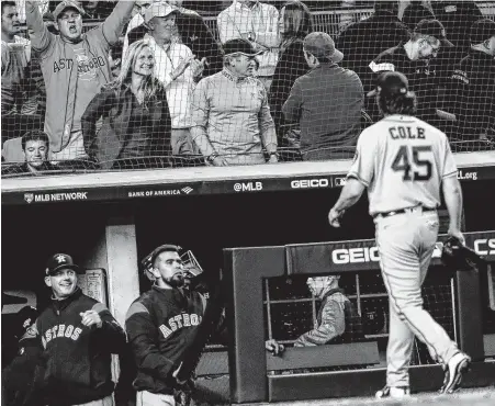  ?? Brett Coomer / Staff photograph­er ?? By throwing seven shutout innings, Gerrit Cole recorded one of the best postseason outings by an opposing pitcher at Yankee Stadium.