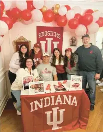  ?? COURTESY ?? Emmaus’ Mario Landino is surrounded by family and friends Wednesday night as he commits to attend Indiana University.