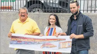  ?? SADIE-RAE WERNER/SPECIAL TO THE TELEGRAM ?? From left, Coun. Sandy Hickman, artist Julie Lewis and a representa­tive from the Paint Shop reveal the design for a mural commemorat­ing the Great Fire of 1892 on Mcbride’s Hill.