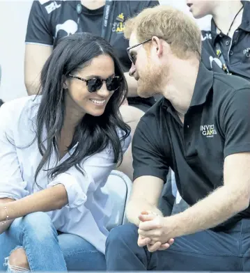  ?? WENN FILES ?? Meghan Markle and Prince Harry are seen together during September’s Invictus Games in Toronto. Rumours are swirling that the couple may be getting engaged after they had afternoon tea with Queen Elizabeth.