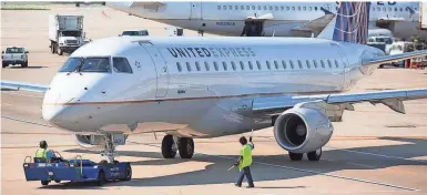  ?? JEREMY DWYER-LINDGREN/SPECIAL TO USA TODAY ?? United, shown at Chicago O’Hare, is adding three routes in Denver.