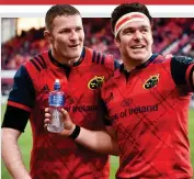  ?? SPORTSFILE ?? Old pals act: Donnacha Ryan (left) in Munster red with Billy Holland