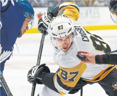  ?? CLAUS ANDERSEN GETTY IMAGES ?? Sidney Crosby’s Penguins will face off against Auston Matthews and the Leafs at Scotiabank Arena on Saturday night.