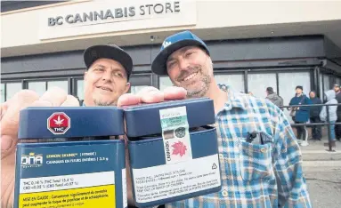  ?? JONATHAN HAYWARD THE CANADIAN PRESS ?? Visitors from the United States were among the customers at B.C.’s first legal cannabis store in Kamloops on Wednesday.