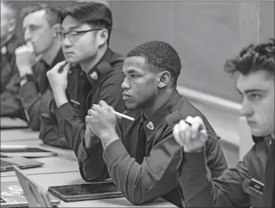  ?? PETER K. AFRIYIE AP PHOTO ?? Cadets participat­e in a class on American politics at the United States Military Academy at West Point, N.Y. The emphasis for the next generation of military officers that their loyalty must be focused on the nation’s democratic underpinni­ngs rather than on any individual is a reflection of how the armed forces are being forced to deal with America’s deep political polarizati­on.