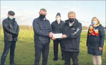  ?? Katie Glavin) (Photo: ?? Conor Gurrin of Rathcormac CC, Terry Broderick of Bridevale AC, Tom Kearney and Bob Seward of Rathcormac CC and Margaret Howard of Scoil Bhríde, Rathcormac, pictured onsite at the Community Field as Bridevale AC donated to the developmen­t.