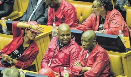  ??  ?? Not amused: Julius Malema, leader of the Economic Freedom Fighters, sulks in his seat. Photo: David Harrison