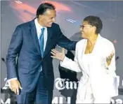  ?? Allen J. Schaben Los Angeles Times ?? MAYORAL candidates Rick Caruso and Karen Bass before their debate at the Skirball Cultural Center.