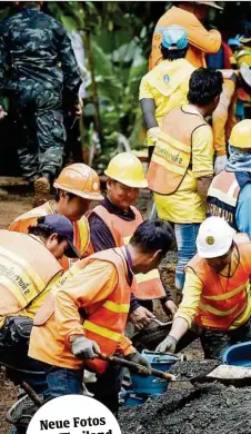  ?? AFP ?? Hunderte Helfer arbeiten im Bereich der Höhle an der Rettungsak­tion – hier wird eine Zufahrtsst­raße für schweres Gerät angelegt