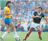  ?? ?? Graeme Souness up against Brazil’s Socrates in 1982