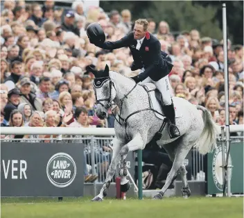  ??  ?? Oliver Townend wins the 2017 Burghley Horse Trials on Ballaghmor Class.