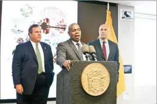  ?? NEW YORK TIMES BRYAN ANSELM/THE ?? Mayor Ras Baraka of Newark speaks during a news conference with New Jersey Governor Chris Christie (left) and Senator Cory Booker in Newark, New Jersey, on October 16.