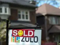  ?? GRAEME ROY, THE CANADIAN PRESS ?? Home sales in the Greater Toronto Area fell 20.3 per cent in May compared with the same month a year ago.