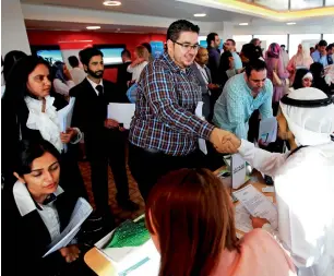  ?? KT file photo ?? Students of the Dubai University and Job seekers waiting for their tern for the interview at the University of Dubai Job Fair at Dubai Chamber. —