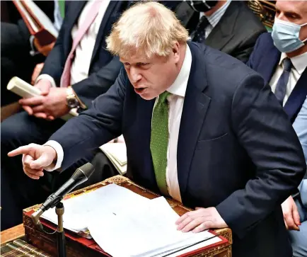  ?? ?? Feisty peformance: Boris Johnson ditches his ‘woe-is-me’ routine to good effect at PMQs yesterday