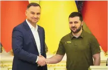  ?? EFREM LUKATSKY/ASSOCIATED PRESS ?? Ukrainian President Volodymyr Zelenskyy, right, and Polish President Andrzej Duda at a news conference after their meeting in Kyiv, Ukraine. The Polish leader implored Ukraine to not submit to Russia.