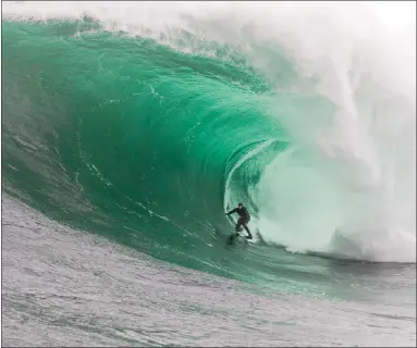  ?? WSL/CHISHOLM ?? BIG WATER ABOVE: Australia’sTyler Hollmer-Cross has been nominated for the WSL Big Wave Awards Tube of the Year for this wave.