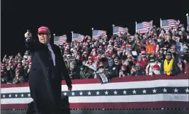  ?? DOUG MILLS — THE NEW YORK TIMES ?? President Trump campaigns Saturday in Janesville, Wis. His campaign has made larger advertisin­g reservatio­ns starting next week inWisconsi­n, Minnesota, Ohio and Iowa.