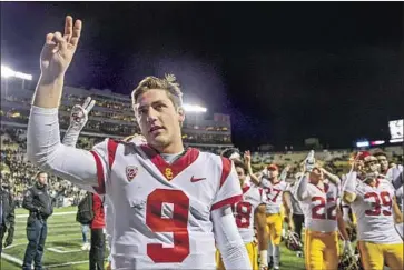  ?? Dustin Bradford Getty Images ?? QUARTERBAC­K Kedon Slovis, above, and USC will open the season Nov. 7 against Arizona State. The Pac-12 eschewed a Trojans game against Oregon as it attempts to get two 6-0 teams into the conference title game.