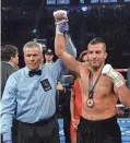  ?? JOE CAMPOREALE/USA TODAY SPORTS ?? David Lemieux celebrates after knocking out Gary O'Sullivan in their middleweig­ht fight in Las Vegas in 2018.