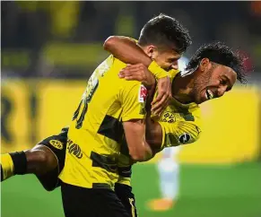  ?? — AFP ?? On fire: Borussia Dortmund’s Pierre-Emerick Aubameyang (right) is in top form with eight goals in six league matches.