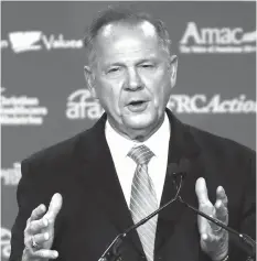  ?? AGENCE FRANCE PRESSE ?? Roy Moore, GOP Senate candidate and former chief justice on the Alabama Supreme Court speaking during the annual Family Research Council’s Values Voter Summit at the Omni Shorham Hotel in Washington, DC.