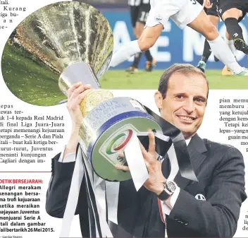  ?? — Gambar Reuters ?? DETIK BERSEJARAH: Allegri merakam kenangan bersama trofi kejuaraan ketika meraikan kejayaan Juventus menjuarai Serie A Itali dalam gambar fail bertarikh 26 Mei 2015.