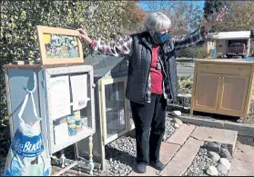  ?? PHOTOS BY JENNY SPARKS / Loveland Reporter-herald ?? Sharon Shuster Anhorn waves to people who help support her Little Free Pantry Thursday, outside her house on the corner of 13th Street and Garfield Avenue in downtown Loveland.