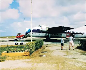  ?? ?? Baggage check: our winner recalls her Mini being flown from Kent to Le Touquet in 1961