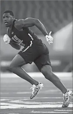  ?? SUBMITTED PHOTO ?? Marquel Lee, a 2013 Westlake High School graduate pictured here going through drills in the NFL Scouting Combine in February, was selected in the fifth round of the NFL Draft on Saturday by the Oakland Raiders.