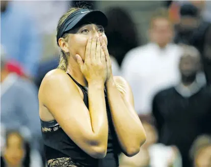  ?? KATHY WILLENS/THE ASSOCIATED PRESS ?? Maria Sharapova reacts after beating Simona Halep on Monday in their U.S. Open match in New York.