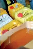  ??  ?? Large containers of used cooking oil, mixed oil products as well as oil which appeared to have been purified by adding chemicals and colouring