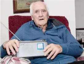  ??  ?? The radio kept close to his favourite chair in his Warragul home is one of 92 year-old Bob Allen’s main links to the outside world due to his vision impairment, but the special Gippsland radio service broadcast from Vision Australia’s Warragul premises is in danger due to a lack of funding.