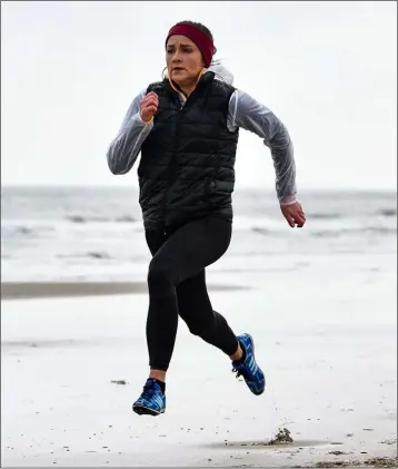  ??  ?? Internatio­nal athlete Phil Healy training on the beach close to her temporary Curracloe base last week.