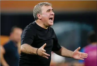  ??  ?? Gheorghe Hagi barking out the orders from the sideline in his current coaching role.