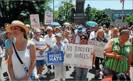  ?? TANIA BARRICKLO — DAILY FREEMAN ?? Hundreds gathered Saturday outside of City Hall in Kingston, N.Y. to rally against the Trump’s immigratio­n policy where immigrant families have been separated. After listening to several speakers including organizers and multiple community spiritual leaders, the protest marched up Broadway, turning on Henry Street to go to George Washington Elementary School.