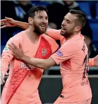  ?? AP ?? Lionel Messi (left) and Jordi Alba celebrate a goal against Espanyol during the La Liga match. —