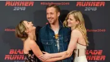  ?? ROBERT MARQUARDT/GETTY IMAGES ?? Blade Runner 2049 stars Ana de Armas, left, Ryan Gosling and Sylvia Hoeks are expected to attend the film’s Comic-Con panel on Saturday.